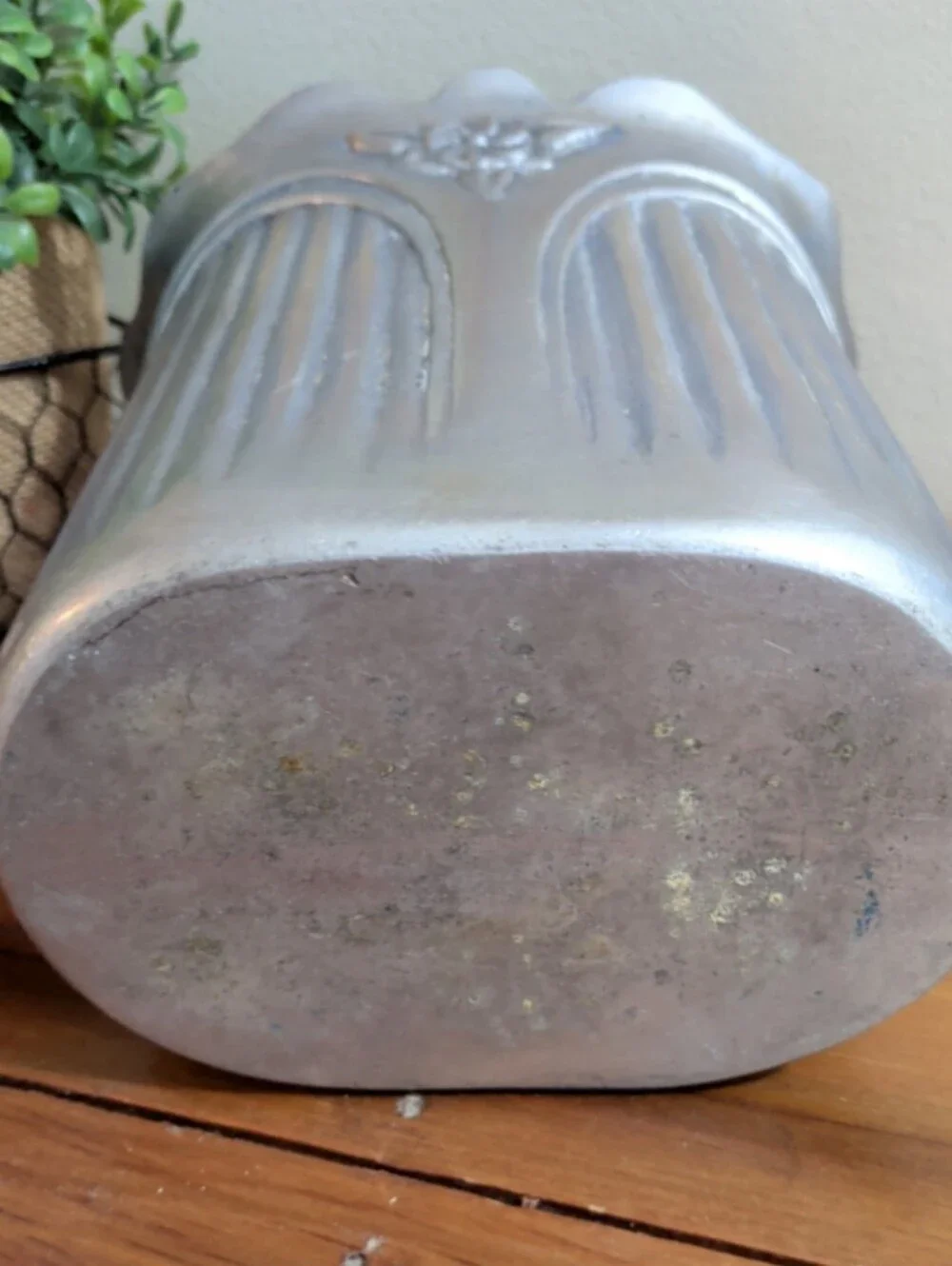 Victorian-style wine cooler made of cast aluminum with a pewter glo
